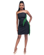 Load image into Gallery viewer, Woman wearing a black strapless dress with green accents on a white background