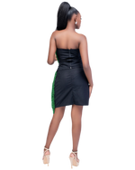 Load image into Gallery viewer, Woman wearing a black strapless dress with green accents on a white background
