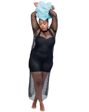 Woman wearing a black bodysuit with fishnet sleeves and pants on a white background